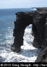 Sea arch at lava/sea boundary
