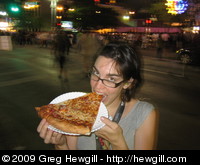 Amy eating a huge pizza at SXSW