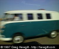 A VW Van zipping by at a combined speed of about 100 mph!