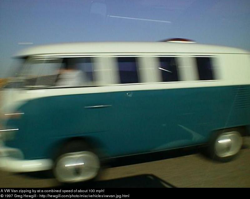 A VW Van zipping by at a combined speed of about 100 mph!
