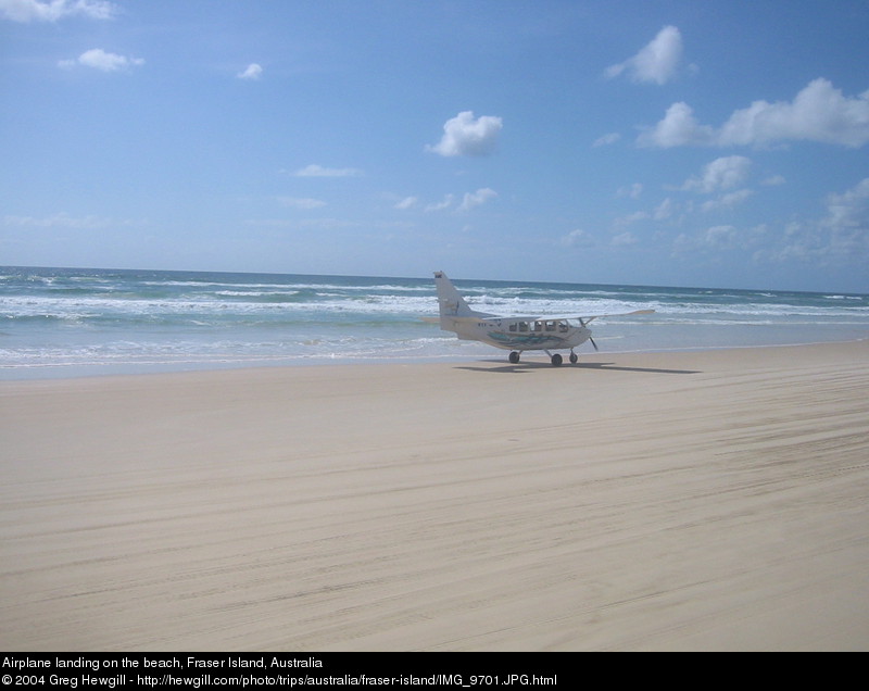 Airplane landing on the beach