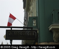 Street sign and flag