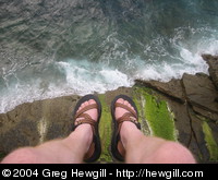 My feet dangling above the waves.