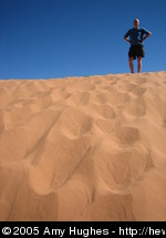 Greg standing on a dune